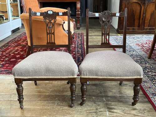Pair of late Victorian carved salon chairs