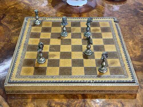 Vintage cast metal chess set, with leatherette board and case