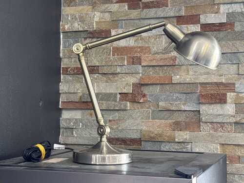 Adjustable silver-tone metal desk lamp