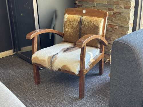 Timber armchair with goat hide upholstery