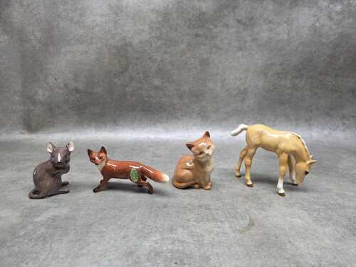 Four Beswick porcelain animal figures