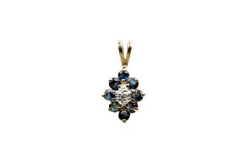 A sapphire and diamond pendant in 9 carat yellow gold