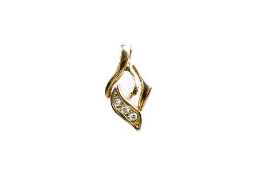 A diamond pendant in 9 carat yellow gold