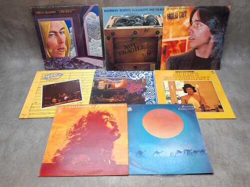 Eight Rock and Pop vinyl records, including Santana