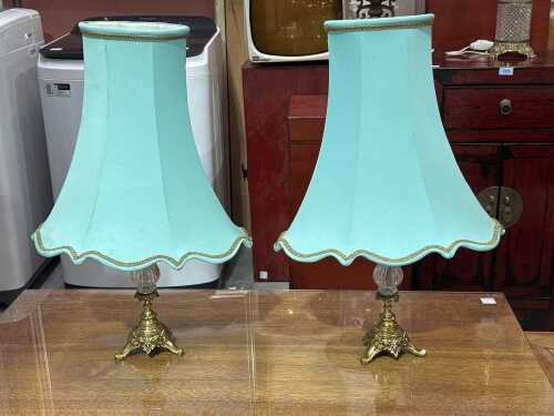 Pair of ornate cast metal and glass table lamps