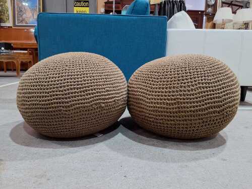 Two Funky Normans knitted pouffes