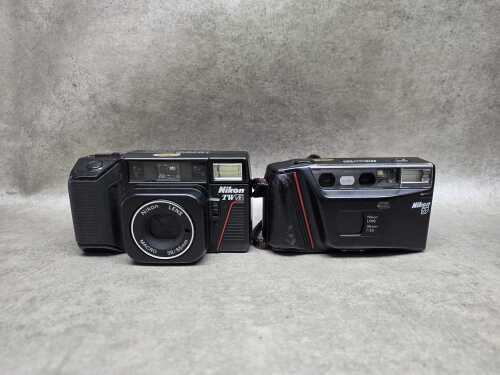 Two Nikon point and shoot film cameras