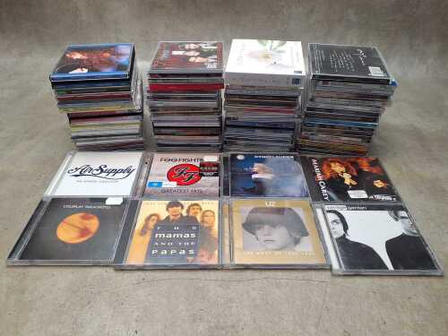 CDs, including U2, Cyndi Lauper, Mariah Carey