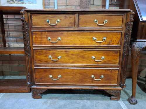 Carved timber five-drawer chest