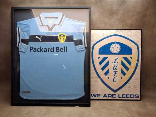 Two Leeds United Football Club framed memorabilia pieces