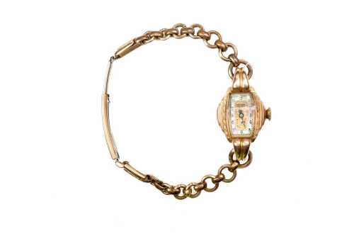 An antique Princess maximus ladies watch in 9 carat yellow gold