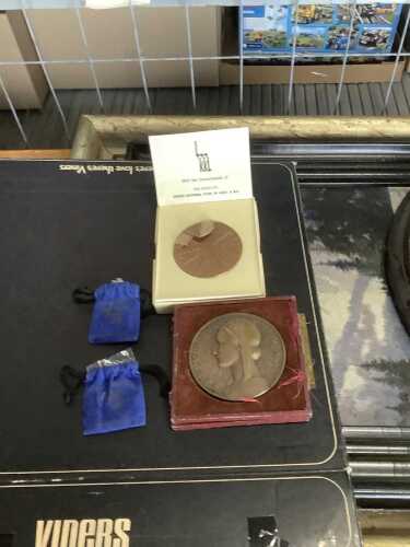 Two commemorative medallions
