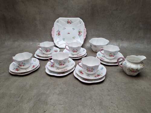 Shelley porcelain tea setting for six including six trios, cake plate, creamer and sugar bowl