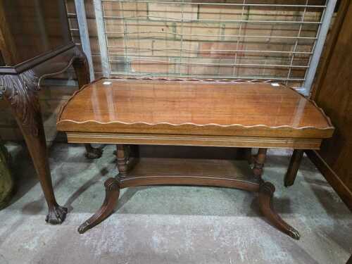 Glass top wooden coffee table