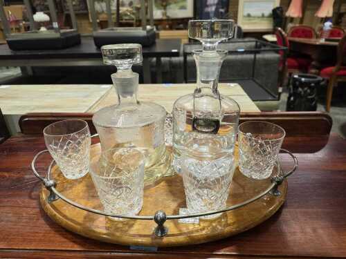 Crystal and glassware on a timber monogrammed serving tray