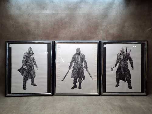 Three framed ink drawings of characters from Assassin Creed