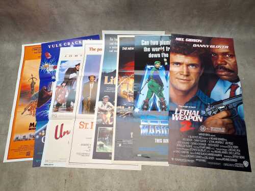Eight mostly '80s movie posters, including James Bond: The Living Daylights