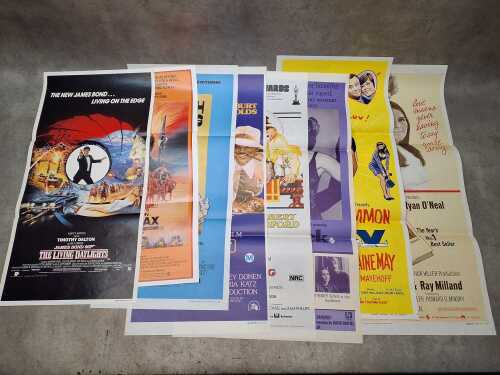 Eight movie posters, including Cheech and Chong: Still Smokin'