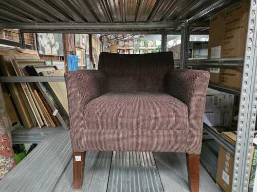 Upholstered armchair with timber legs