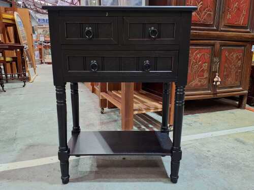 Black three drawer bedside cabinet