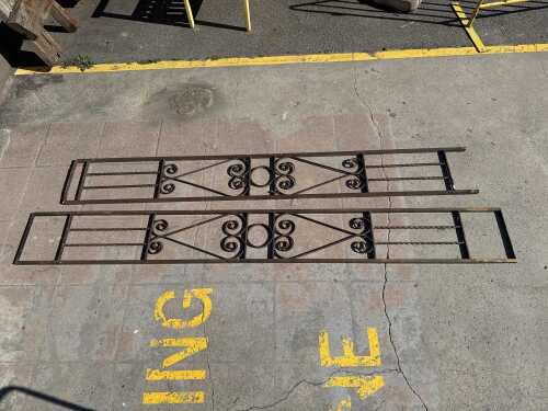 Pair of decorative iron architectural doorway panels