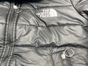 The North Face Women's hooded puffer jacket size S - 4