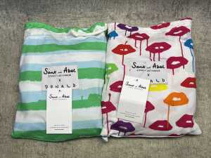 Two pairs of Sant & Abel long pyjamas, size 6