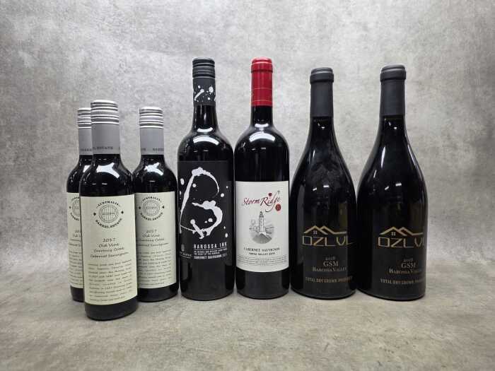 Mixed red wine, seven bottles