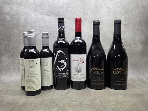 Mixed red wine, seven bottles