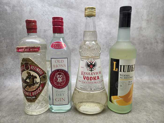 Mixed spirits and liqueur, four bottles