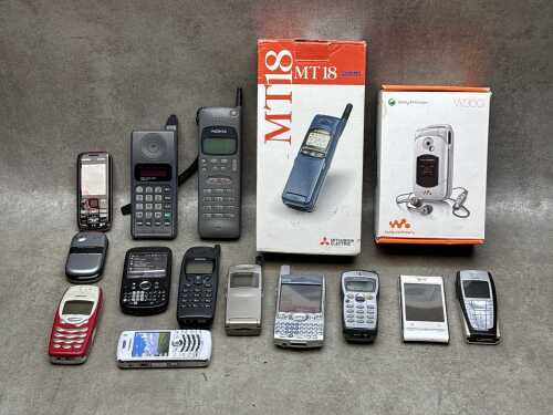 Retro mobile phones, some in original boxes