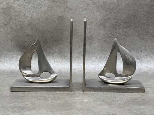 Cast metal bookends with yacht figures