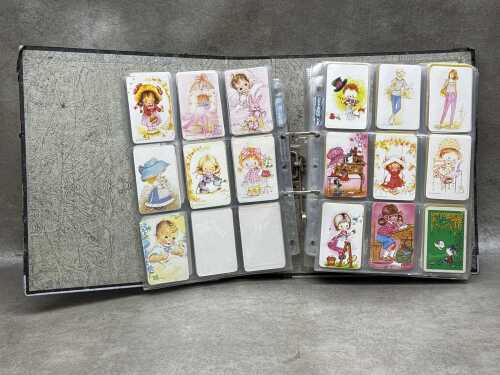 Album of vintage swap cards and playing cards