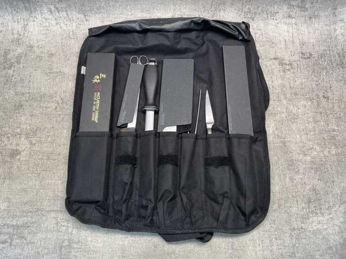 Group of kitchen knives & knife bag