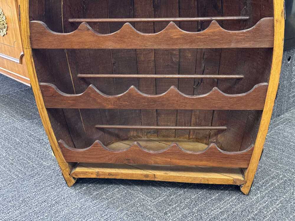 Rustic half barrel-shaped wine rack