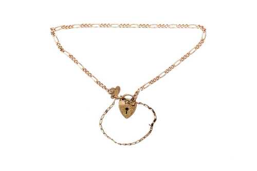 A padlock bracelet in 9 carat yellow gold