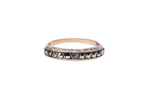 A vintage marcasite ring in 9 carat yellow and white gold
