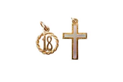 A mother of pearl cross and an 18 pendant in 9 carat yellow gold