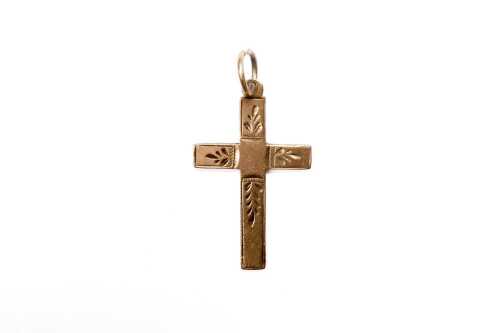 A cross in 9 carat yellow gold