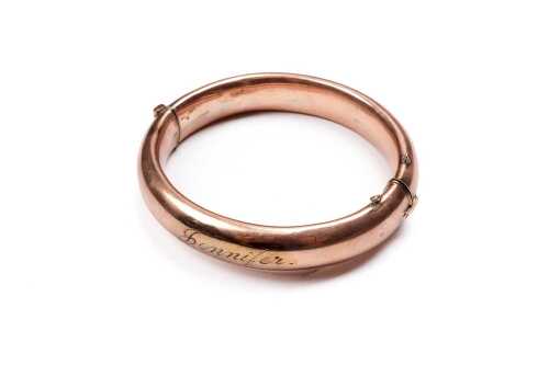 A vintage silver lined 9 carat rose gold bangle