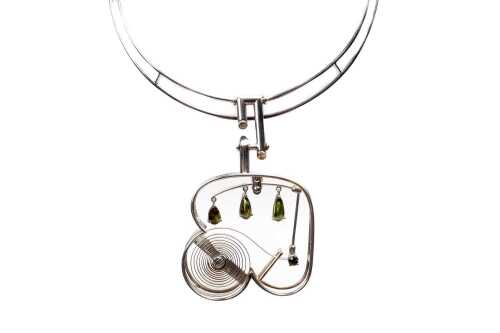 A hand crafted modern peridot necklace in sterling silver