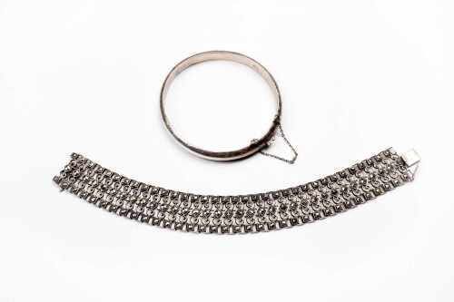 A vintage bangle and bracelet in sterling silver