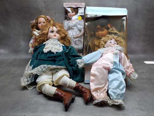 Five porcelain collector dolls, some boxed