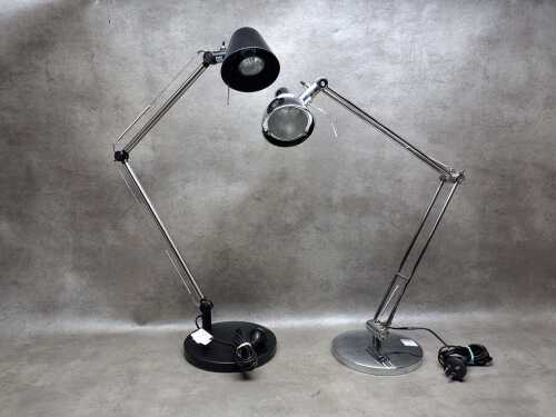 Two articulated desk lamps, in black and chrome
