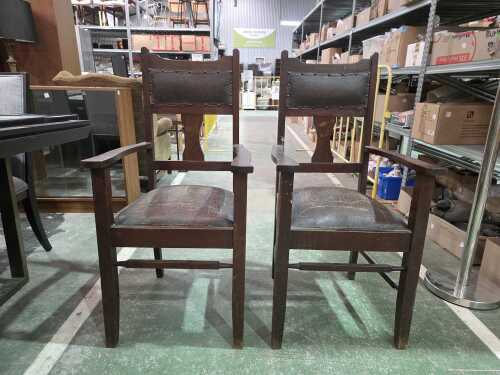Arts and Crafts-style oak armchairs