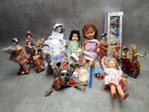 Collector dolls, masks and figures in assorted outfits