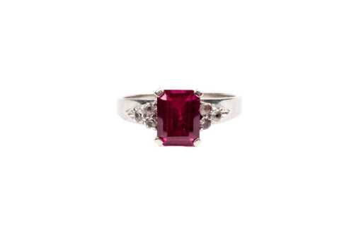 A vintage synthetic ruby and white topaz ring in 9 carat white gold