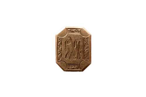 A single cufflink in 9 carat yellow gold