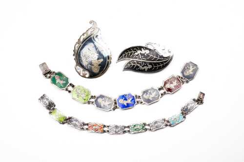 Collection of Siamese silver jewellery