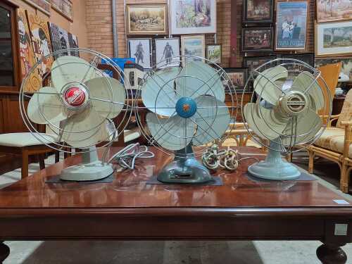 Three metal desk fans - Mistral, Westinghouse and PYE